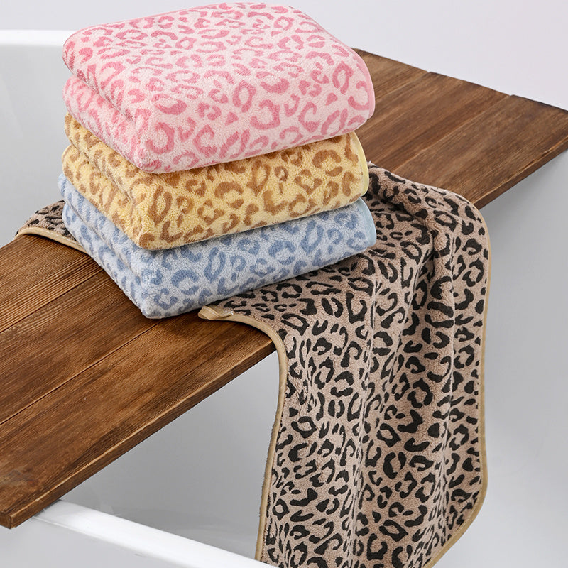 1 Luxury High-Quality Coral Spa Towel • Ultra-soft Microfiber • Quick-drying • Highly Absorbent • Fluffy and Lint-free • New Multi-color Leopard Print Design • Luxurious Bathroom Experience • Spa Essential • Suitable for Pool, Travel, and Gym